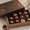 Open custom chocolate box with assorted chocolates arranged in a fitted insert.